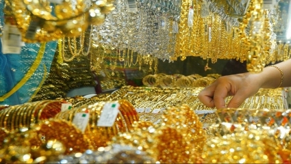 Giá vàng rời đỉnh hơn 8 tháng, neo ngưỡng quan trọng