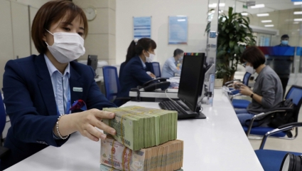 NHNN: Phát hiện trường hợp thế chấp sổ kiệm ngoại tệ vay tiền đồng để gửi tiết kiệm