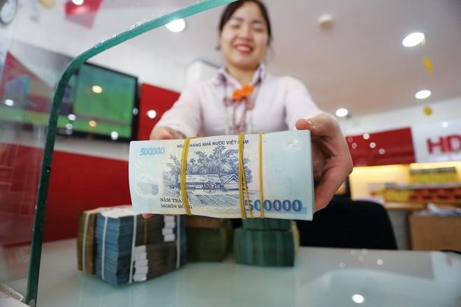 NHNN đ&atilde; c&oacute; th&ocirc;ng b&aacute;o hạn mức hỗ trợ l&atilde;i suất dự kiến năm 2022 tới từng NHTM để triển khai sớm ch&iacute;nh s&aacute;ch (H&igrave;nh minh họa)